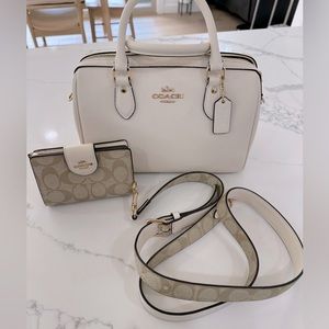 Beautiful ivory crossbody Coach purse with matching wallet.